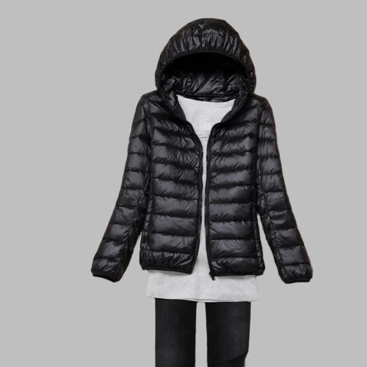 Damowa pikowana kurtka puchowa z kapturem, którą można złożyć do małego rozmiaru