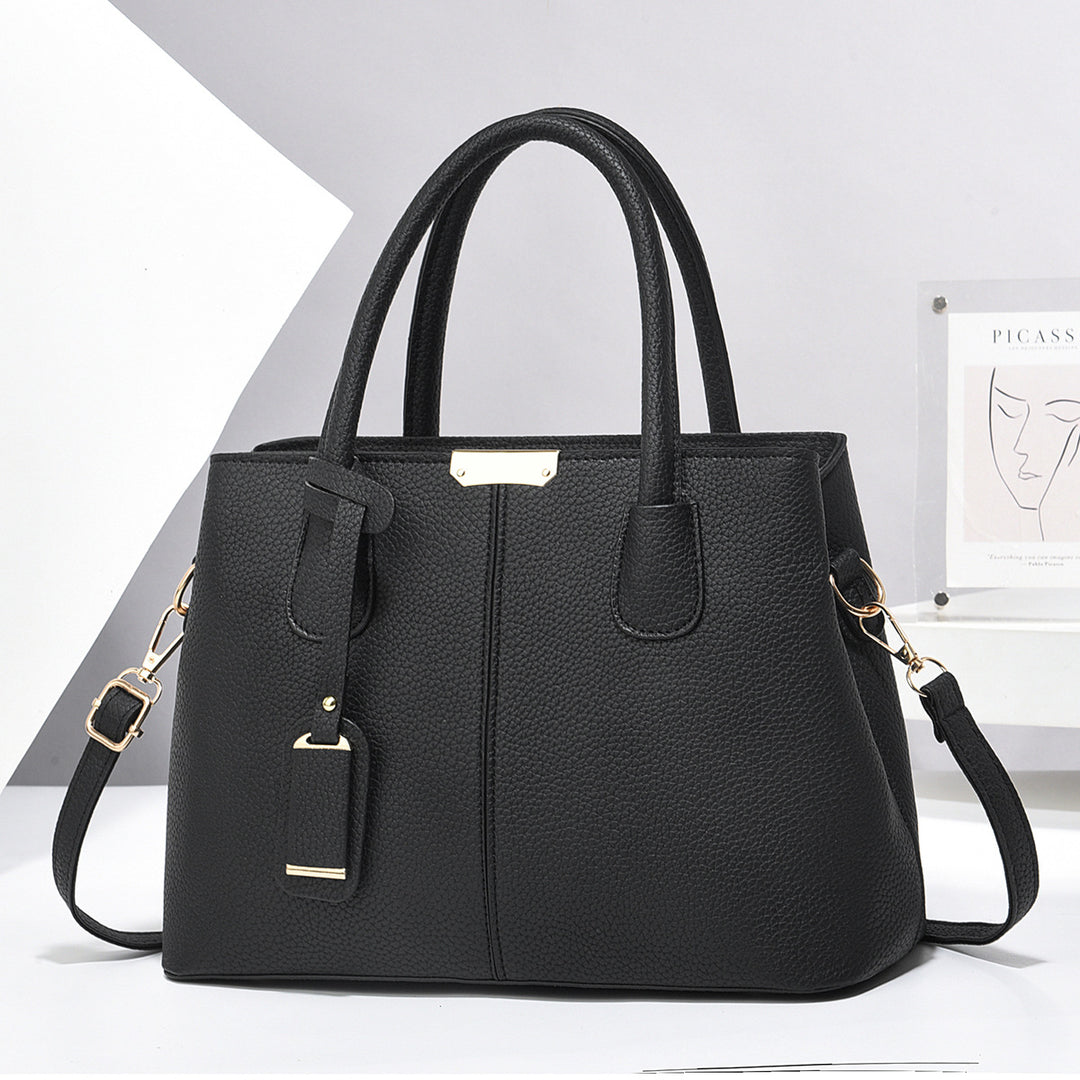 Czarna kwadratowa torebka z ekoskóry z rączkami